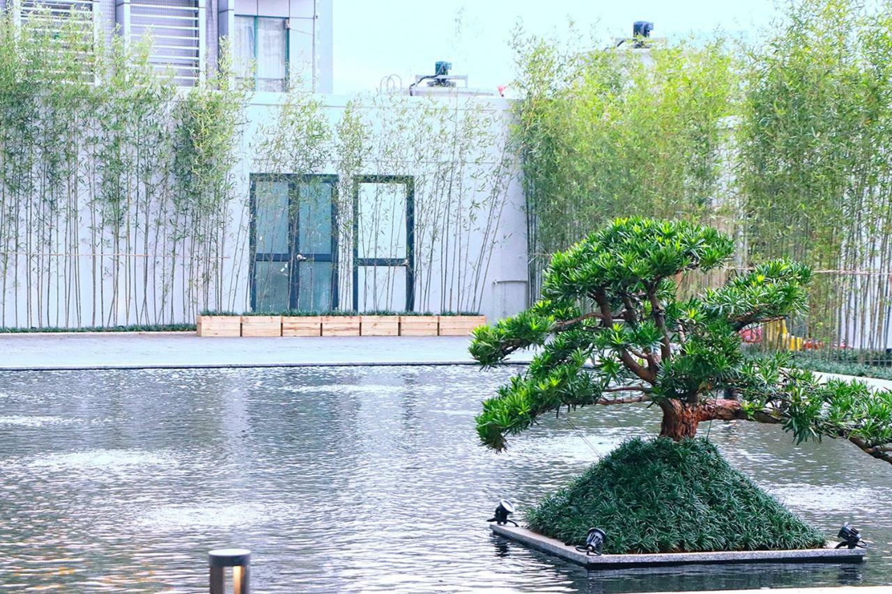 Virtuous World Hotel Foshan Bagian luar foto