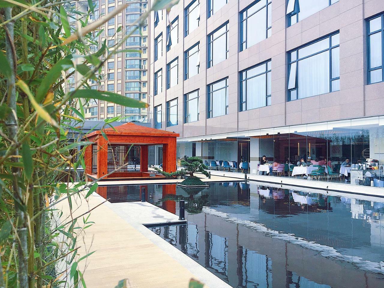 Virtuous World Hotel Foshan Bagian luar foto