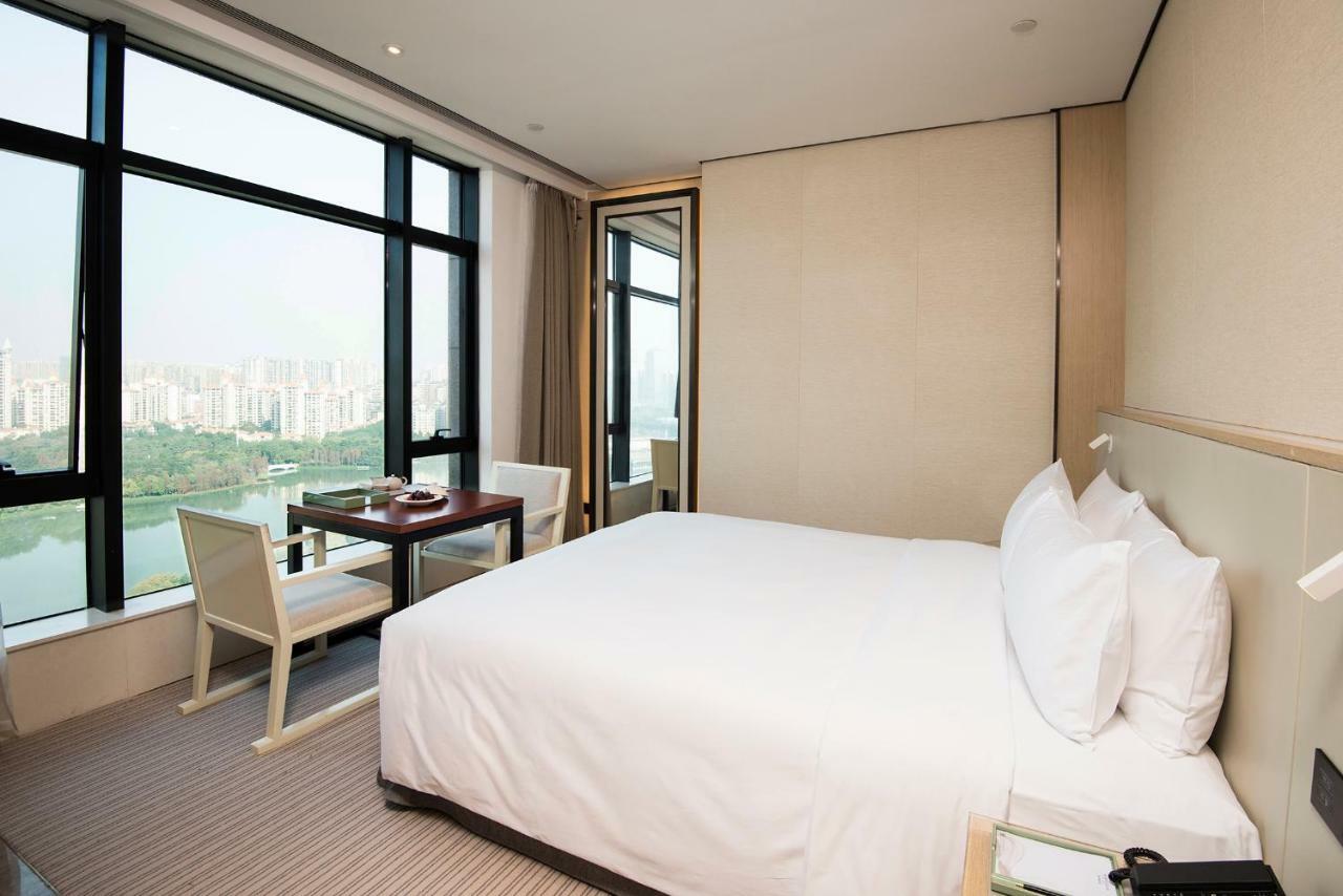 Virtuous World Hotel Foshan Bagian luar foto
