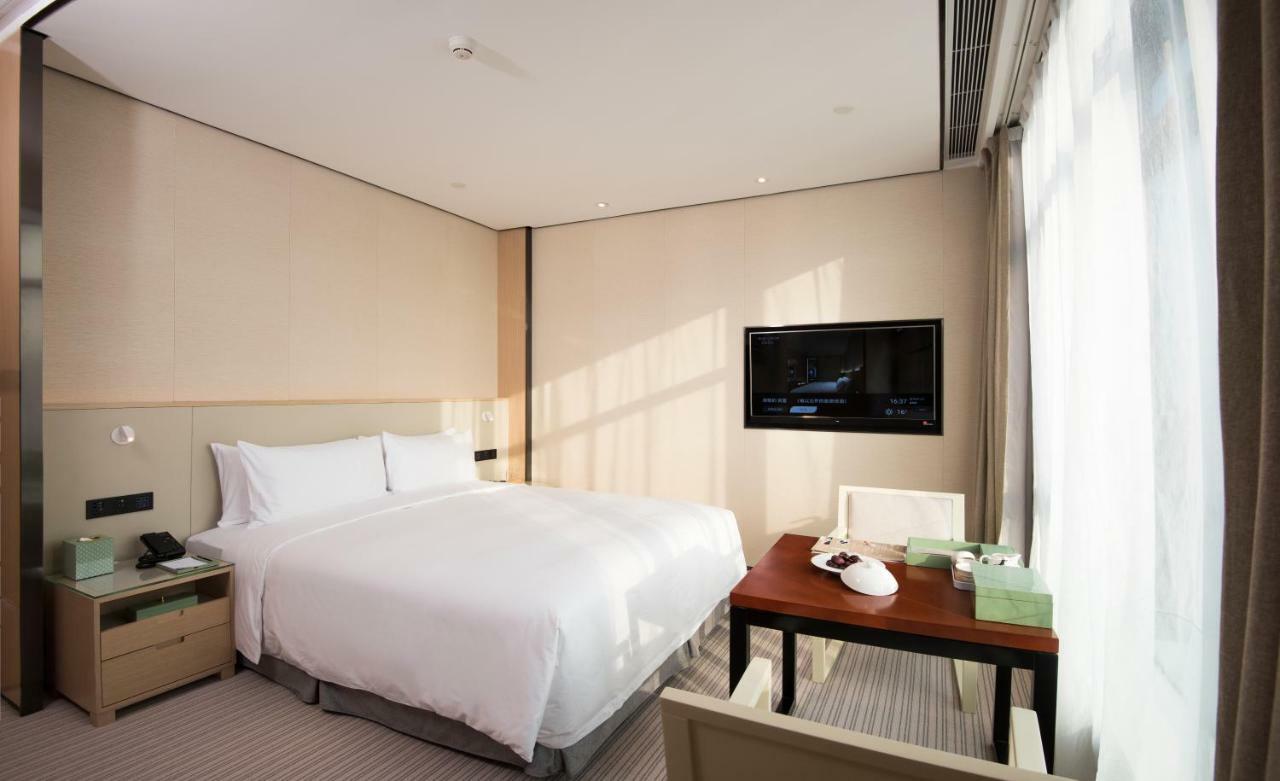 Virtuous World Hotel Foshan Bagian luar foto