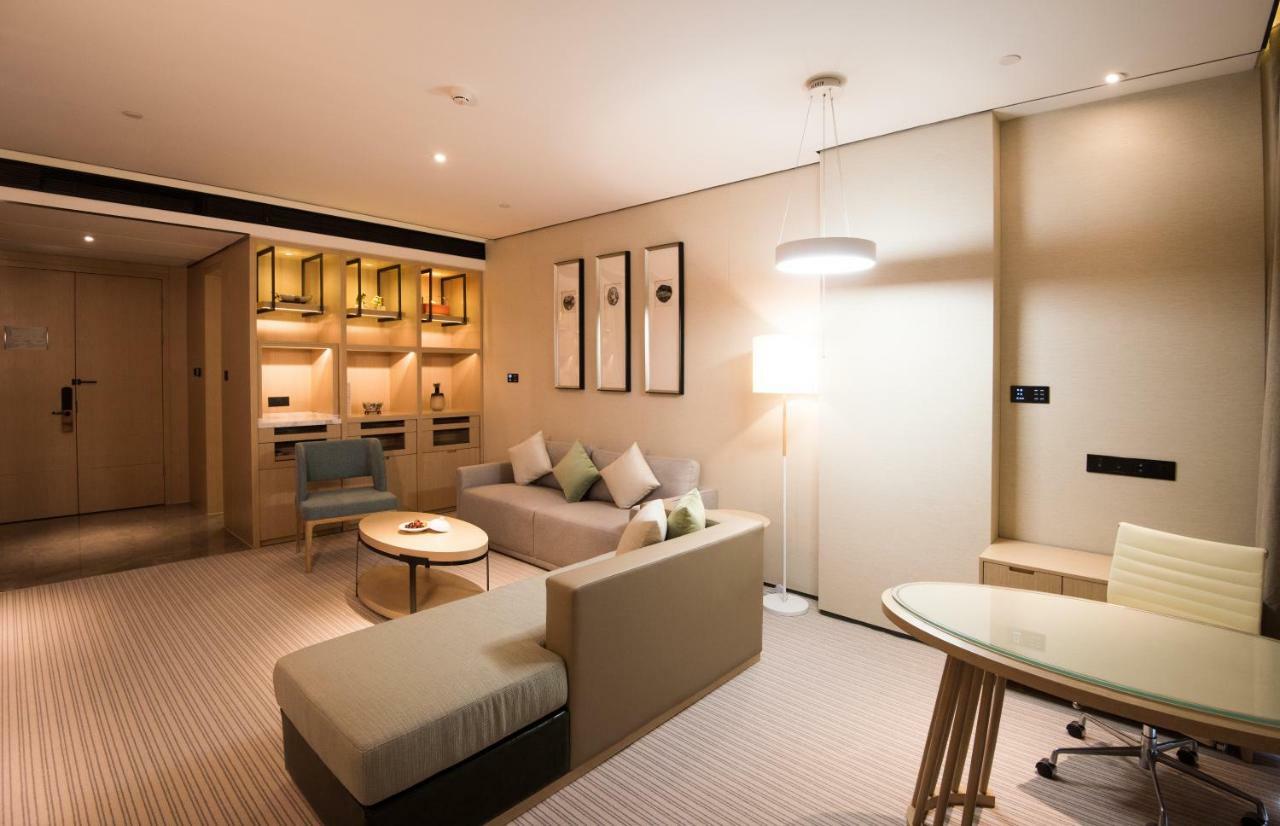 Virtuous World Hotel Foshan Bagian luar foto