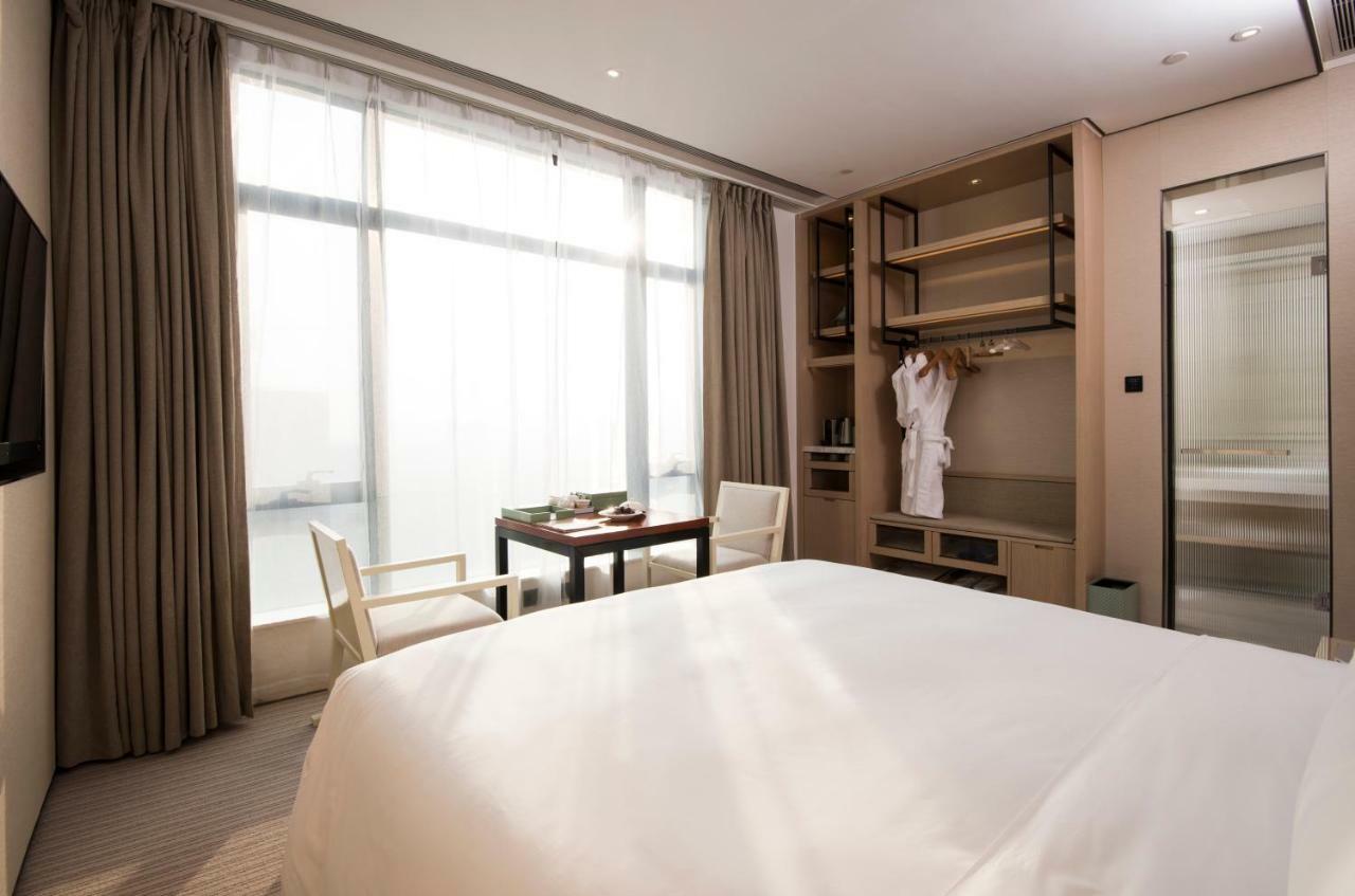 Virtuous World Hotel Foshan Bagian luar foto