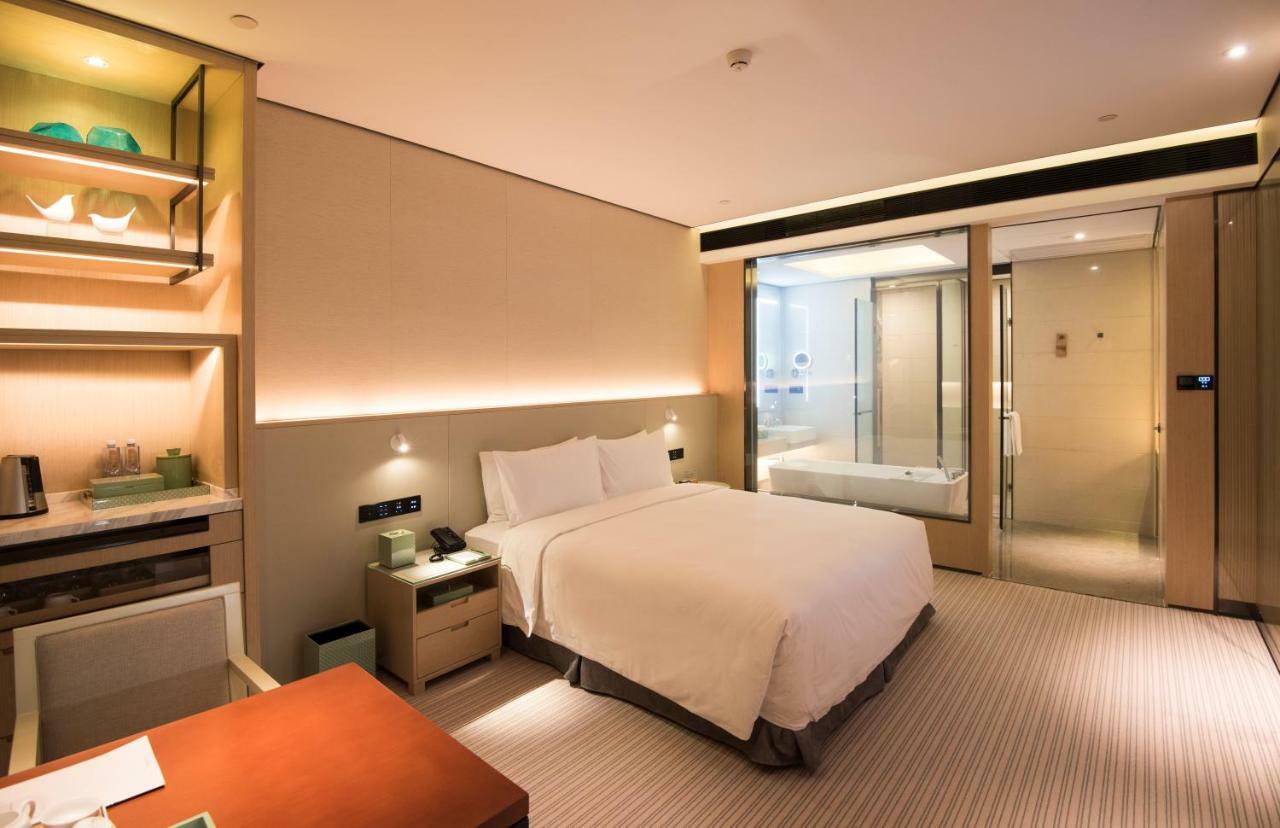 Virtuous World Hotel Foshan Bagian luar foto
