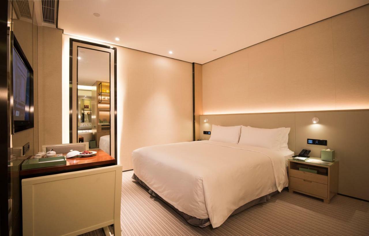 Virtuous World Hotel Foshan Bagian luar foto