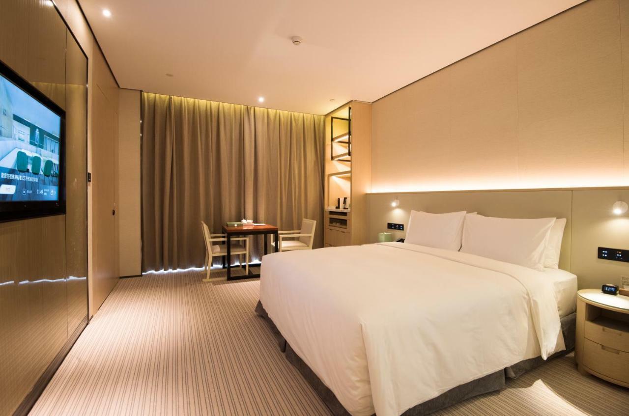 Virtuous World Hotel Foshan Bagian luar foto