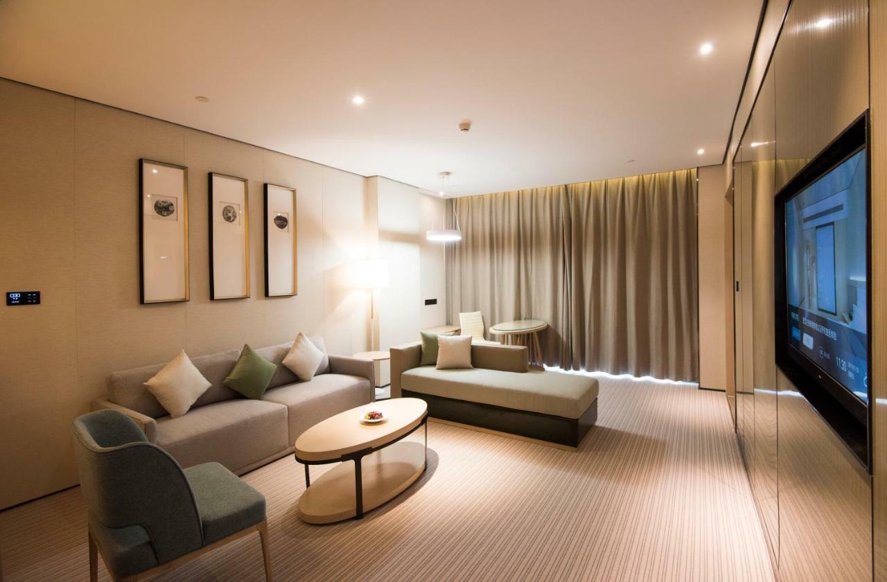 Virtuous World Hotel Foshan Bagian luar foto