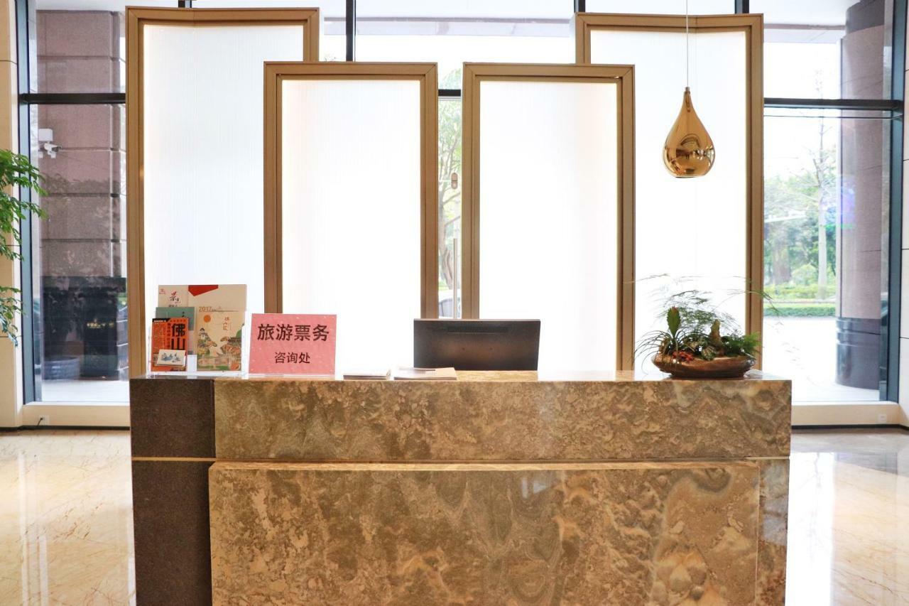 Virtuous World Hotel Foshan Bagian luar foto