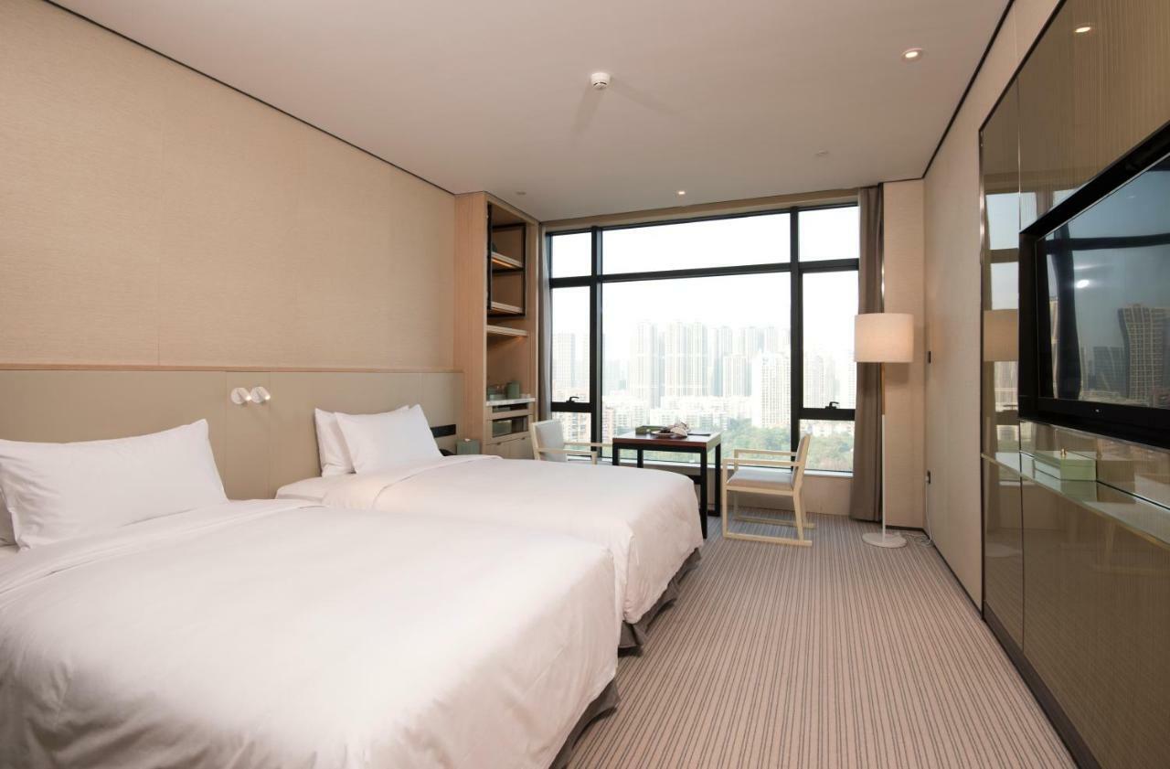 Virtuous World Hotel Foshan Bagian luar foto