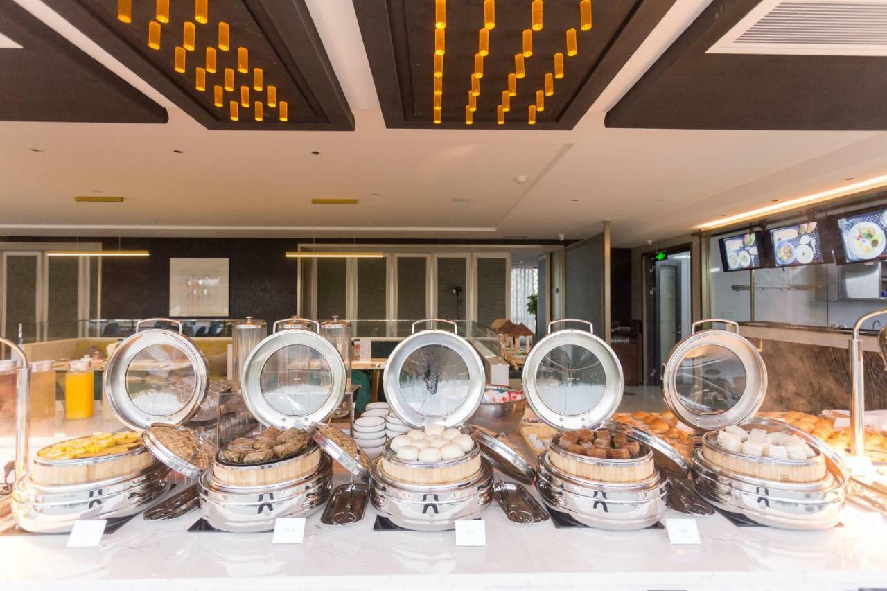 Virtuous World Hotel Foshan Bagian luar foto