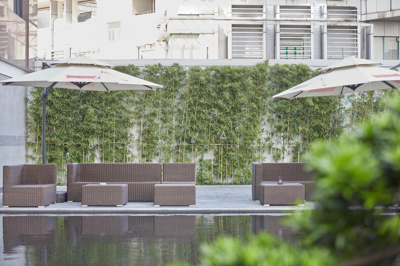 Virtuous World Hotel Foshan Bagian luar foto