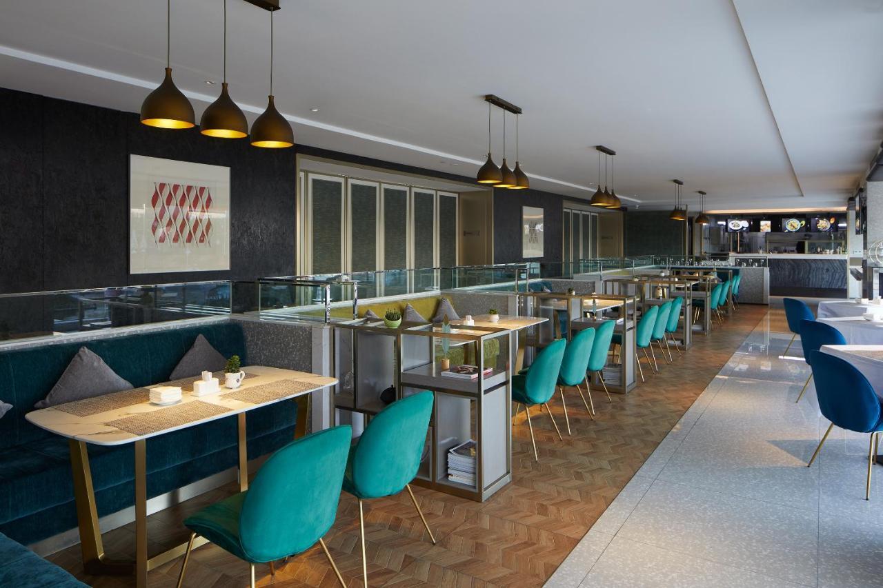 Virtuous World Hotel Foshan Bagian luar foto