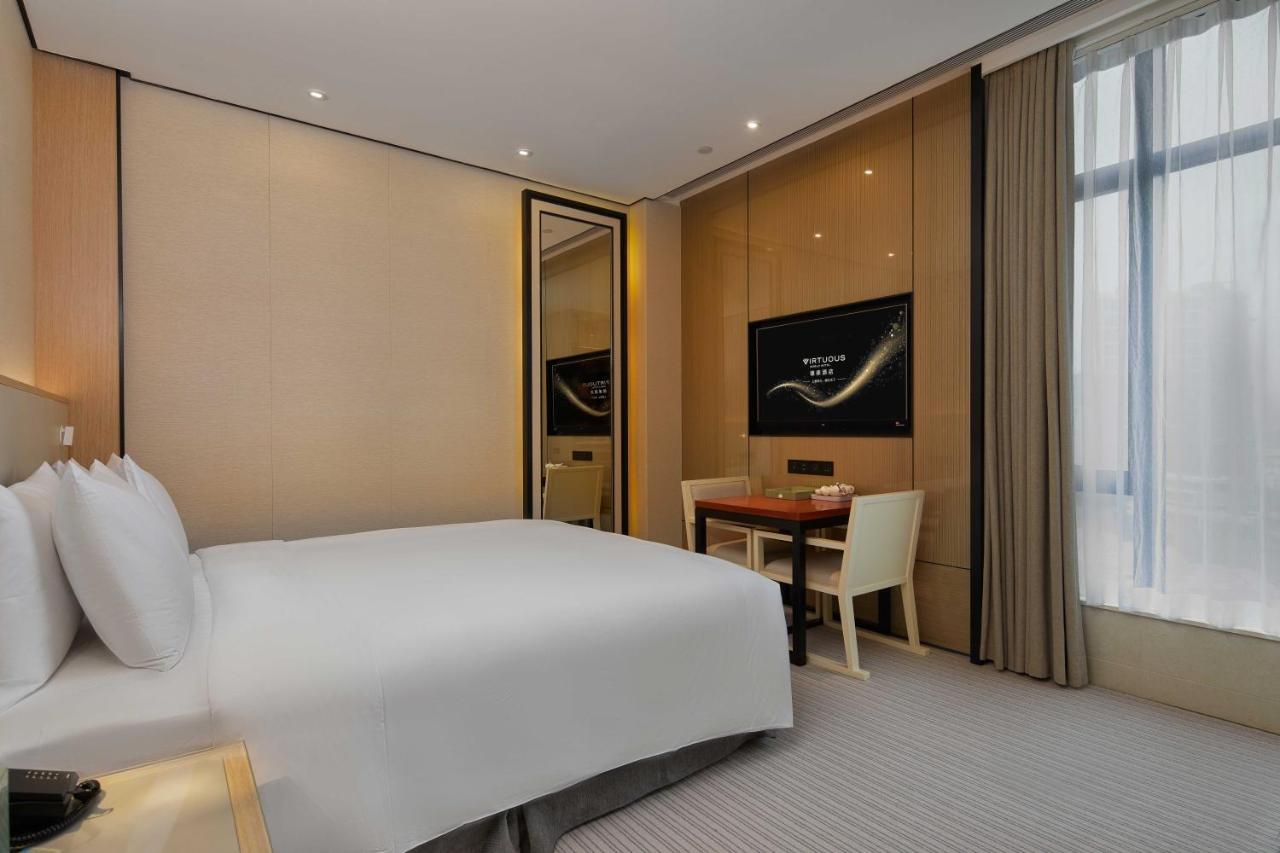 Virtuous World Hotel Foshan Bagian luar foto